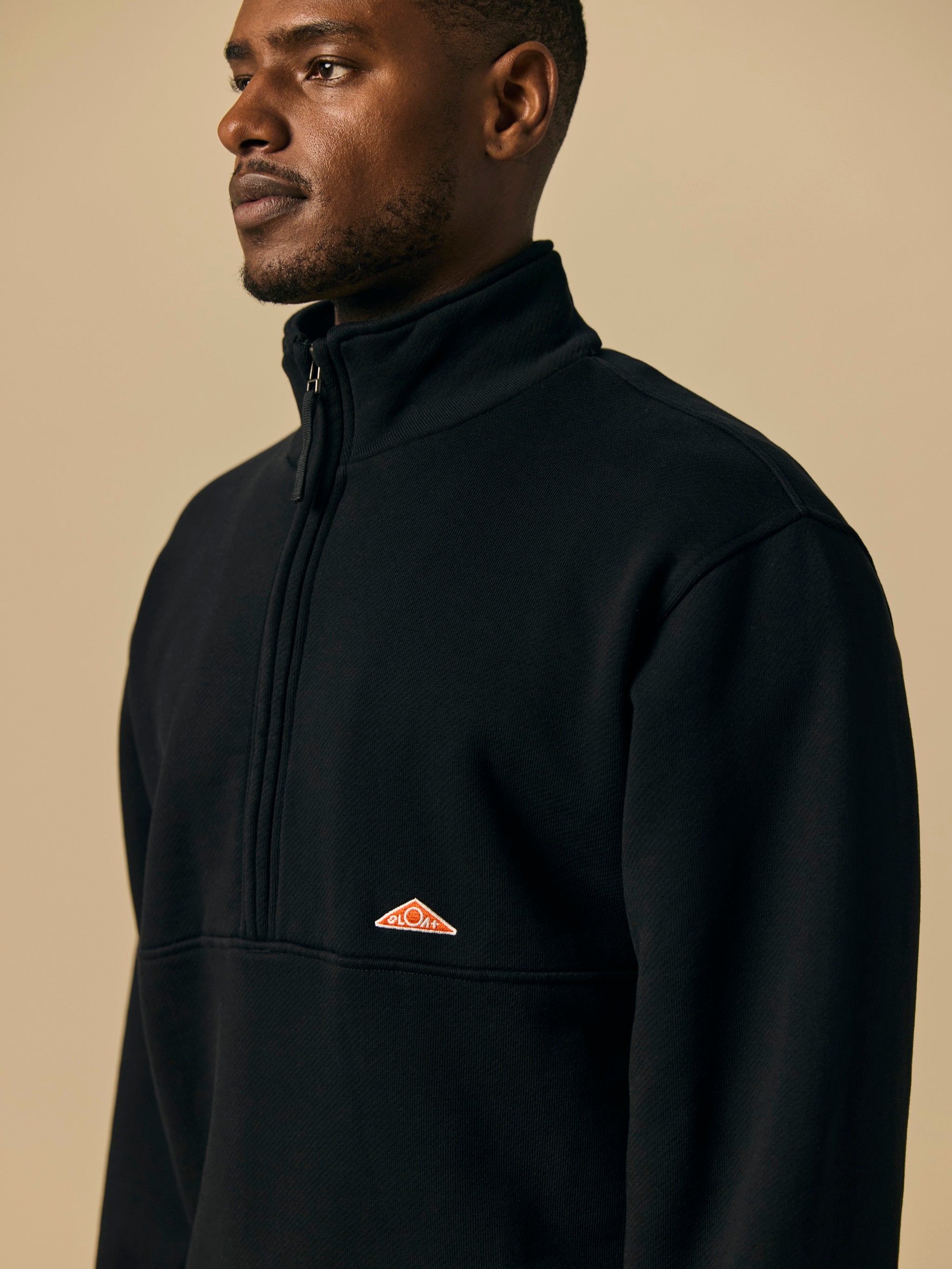 Organic Cotton Fleece Quarter Zip in Black [color:Black]