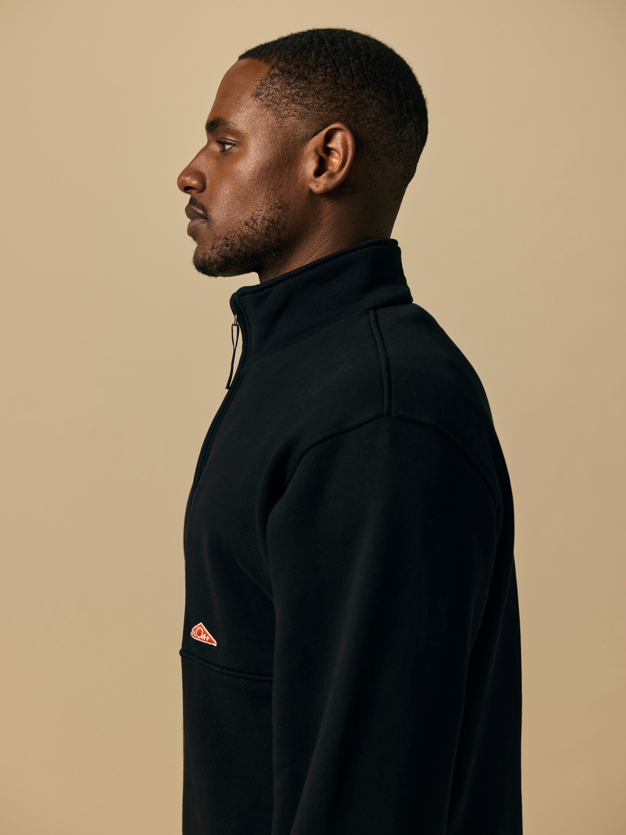 Organic Cotton Fleece Quarter Zip in Black [color:Black]