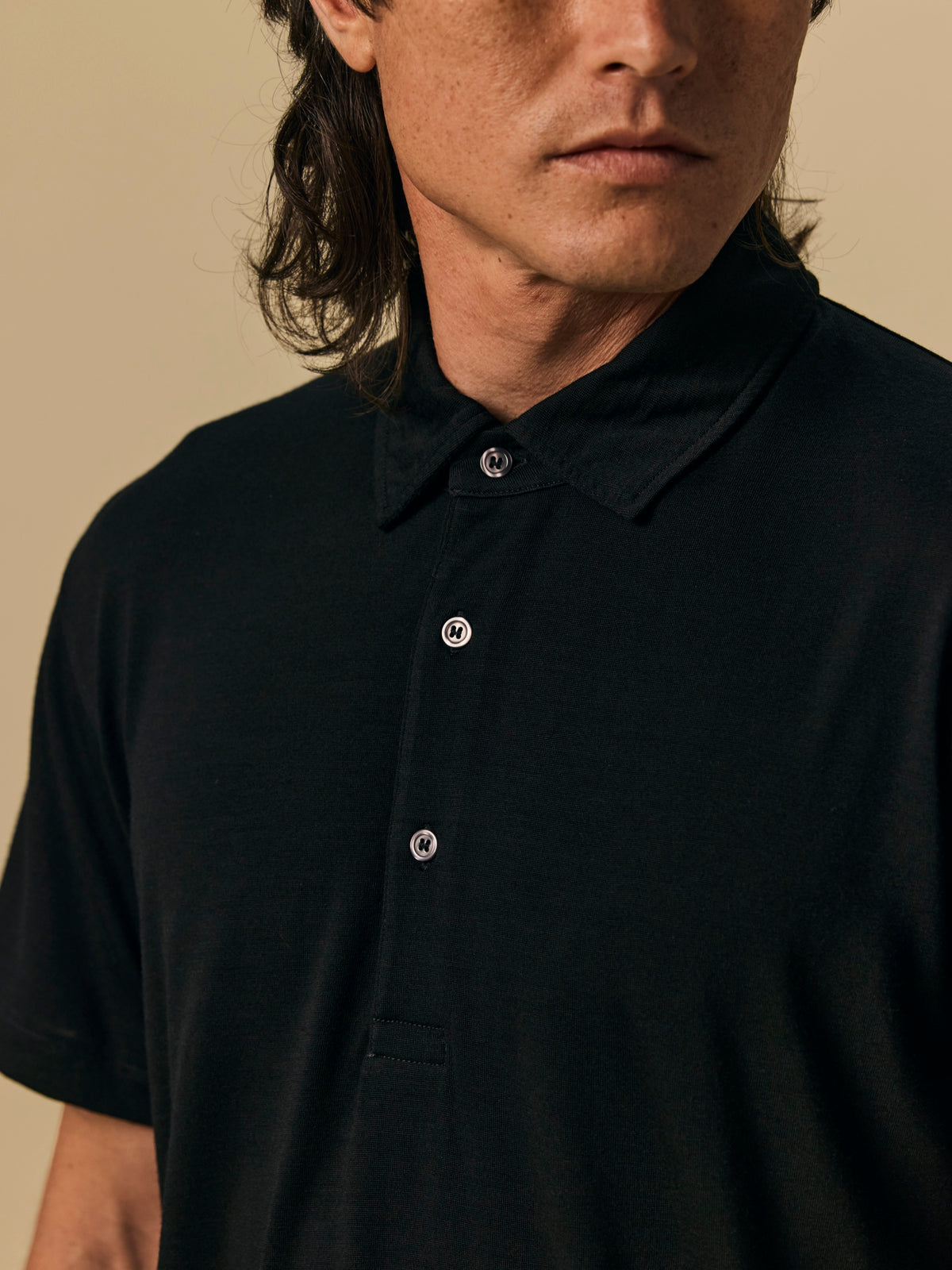 Merino Polo in Black [color:Black]