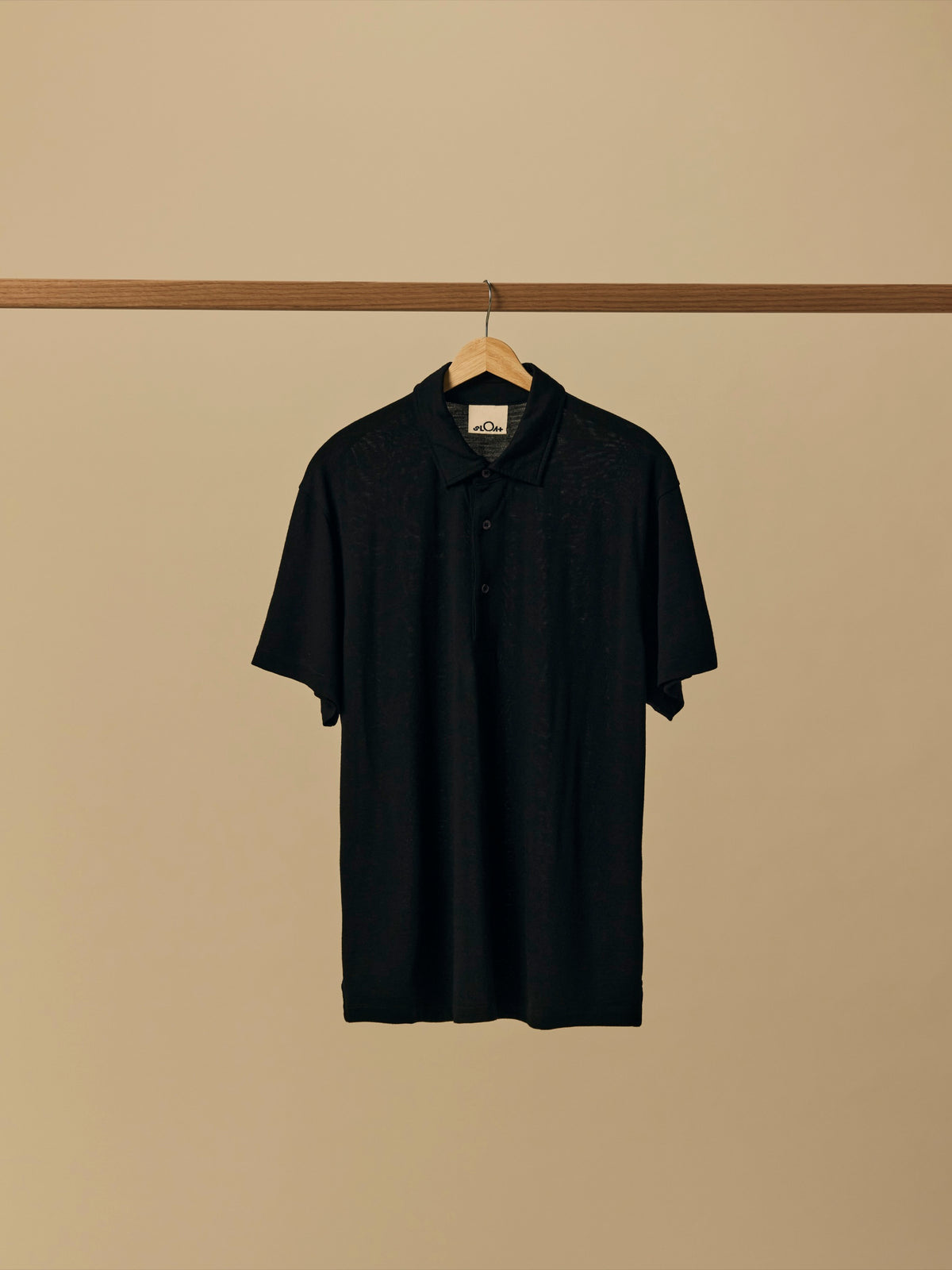 Merino Polo in Black [color:Black]